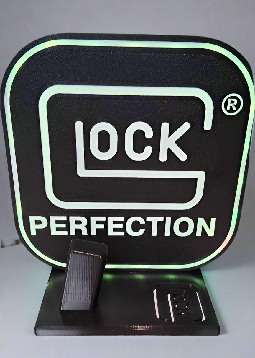 Glock Perfection LED light box with holographic edge glow and display stand — Baldwin Printing and Design Inc.