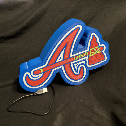 Colorful logo with a USB cable on a black background