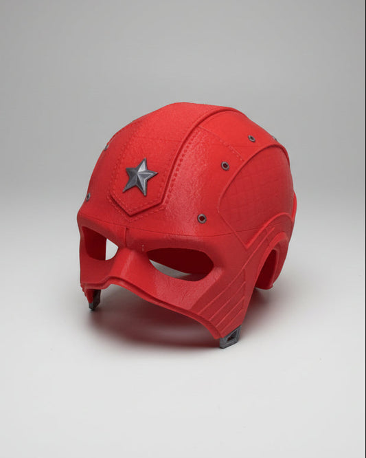 Red helmet with a star emblem on a gray background