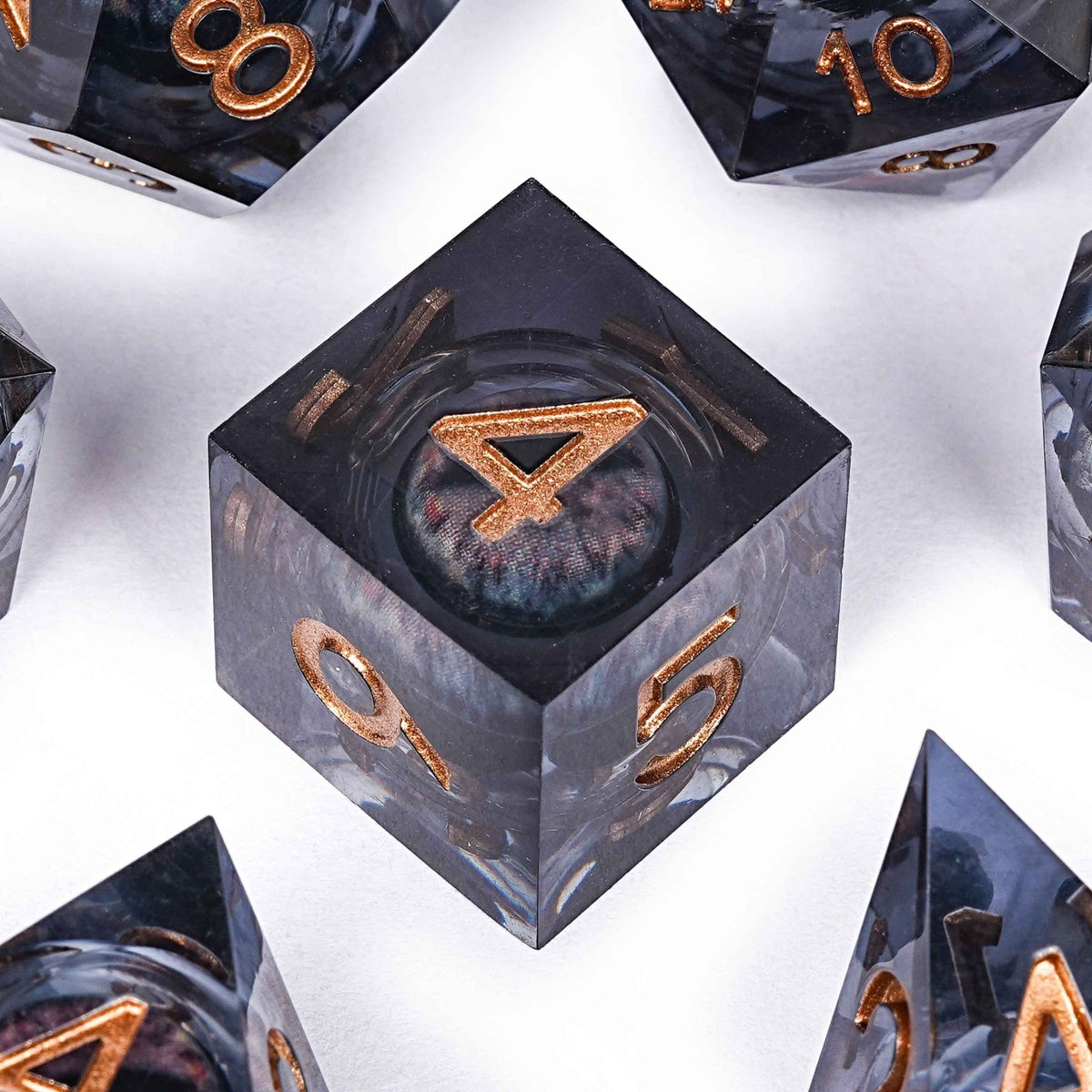 Sharp-edged black dragon's eye transparent liquid core resin DND dice set + copper font